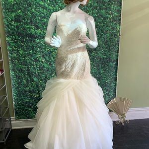 the dress has been bussled and hem wearin 4in shoe